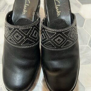 Clarks Women's Black Mules with Geometric Stitching